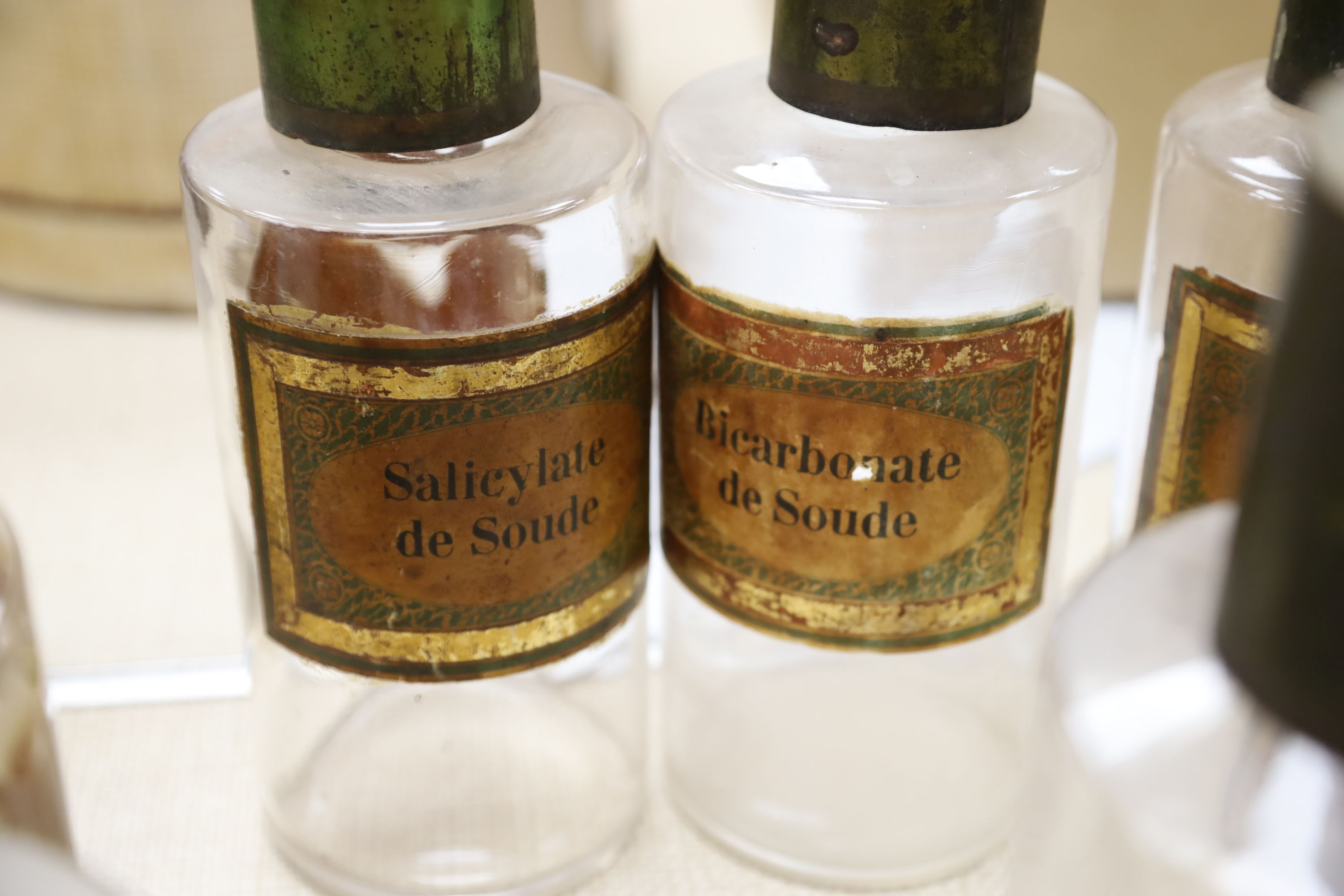 Seven vintage French glass pharmacy jars